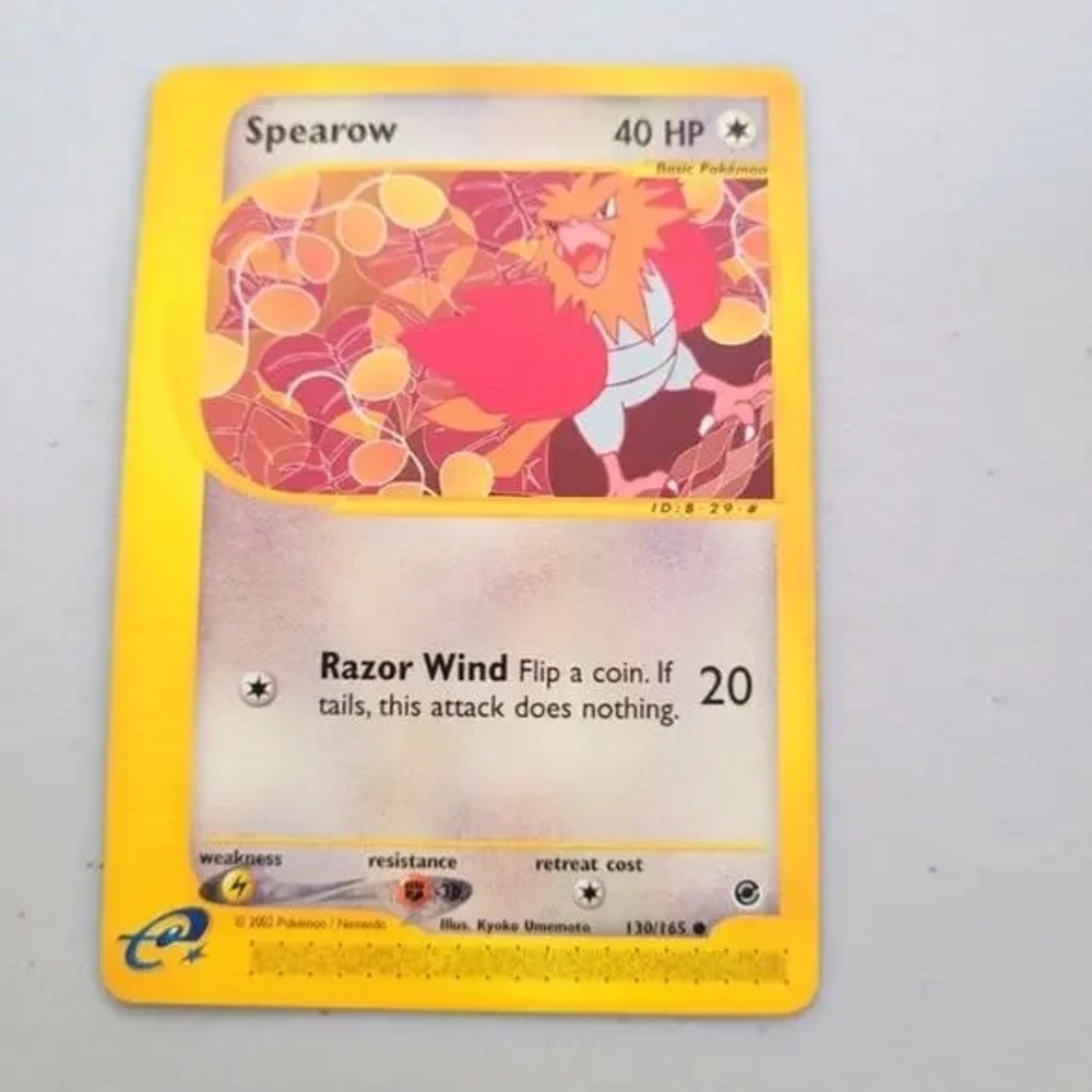 Pokemon Spearow Card with Yellow and Red Design